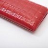 CHANEL clutch in red patent leather