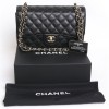 Chanel jumbo double flap bag in black caviar leather