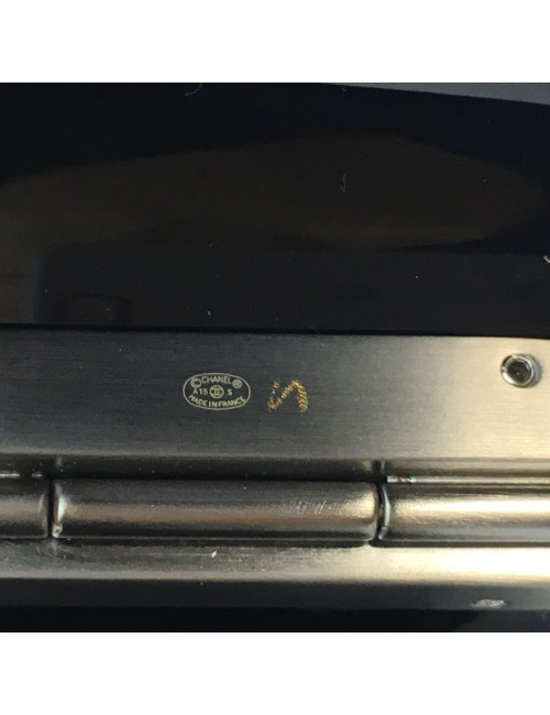 CHANEL cuff bracelet in black plexi and CC in gunmetal color