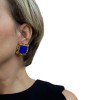 Boucles d'oreille clips YSL SAINT LAURENT en métal doré et résine bleue