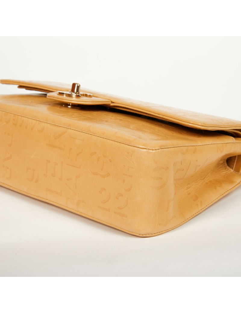 Sac CHANEL cuir d'agneau beige siglé "CHANEL" "CC"