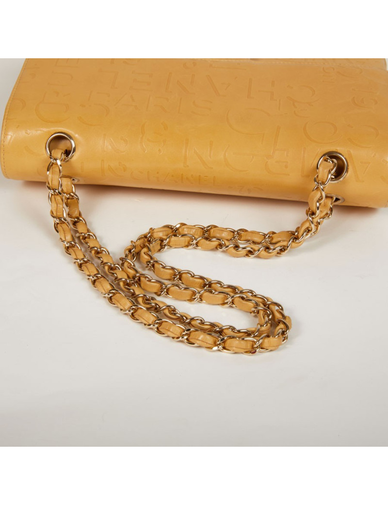 Sac CHANEL cuir d'agneau beige siglé "CHANEL" "CC"