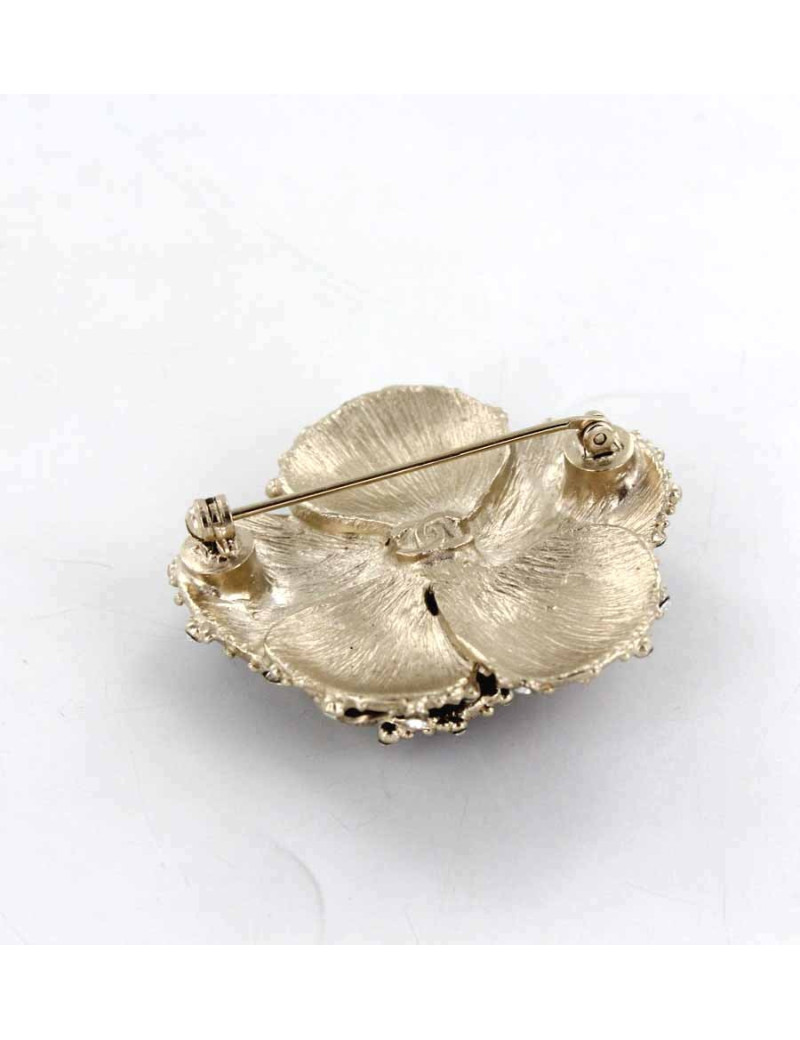Broche CHANEL camelia émaillée