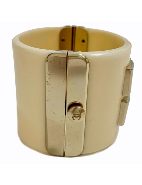 Manchette CHANEL plexiglass ivoire et métal doré 