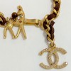 Bracelet CHANEL chaine dorée entrelacée de cuir marron Bambi