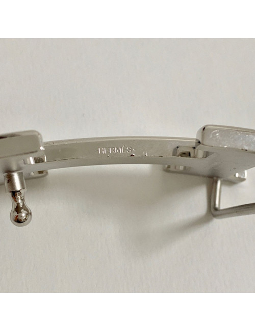 Boucle H HERMES en métal argenté martelé