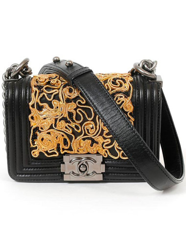 CHANEL mini Boy bag in black lambskin and golden lace