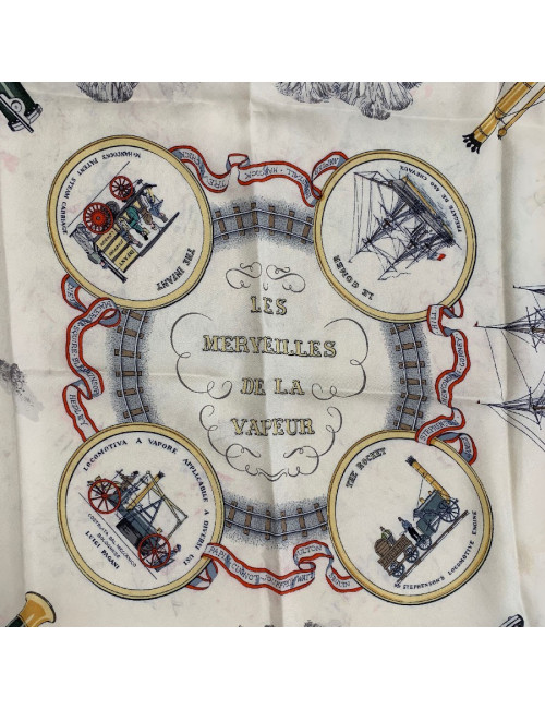 Foulard HERMES "Les merveilles de la vapeur" en soie bleue et beige