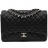 CHANEL maxi Jumbo double flap bag in black quilted caviar leather