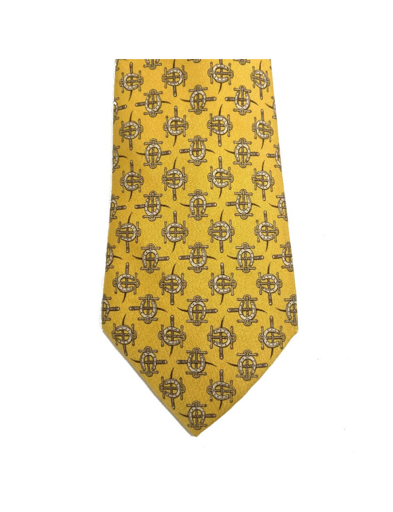 Cravate HERMES jaune en soie motif fers à cheval