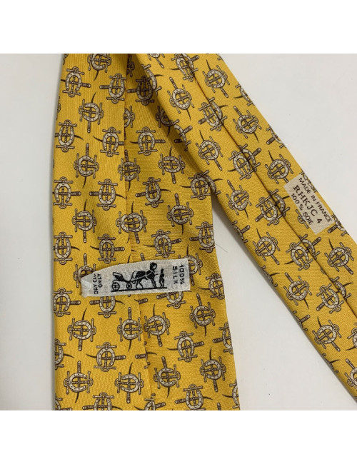 Cravate HERMES jaune en soie motif fers à cheval