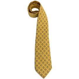 Cravate HERMES jaune en soie motif fer à cheval