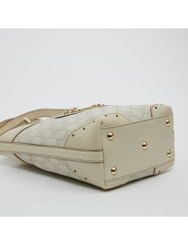 Sac seau GUCCI cuir embossé beige