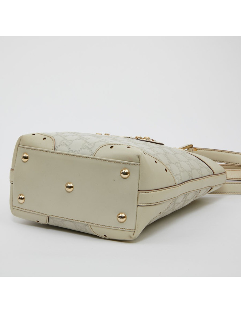 Sac seau GUCCI cuir embossé beige