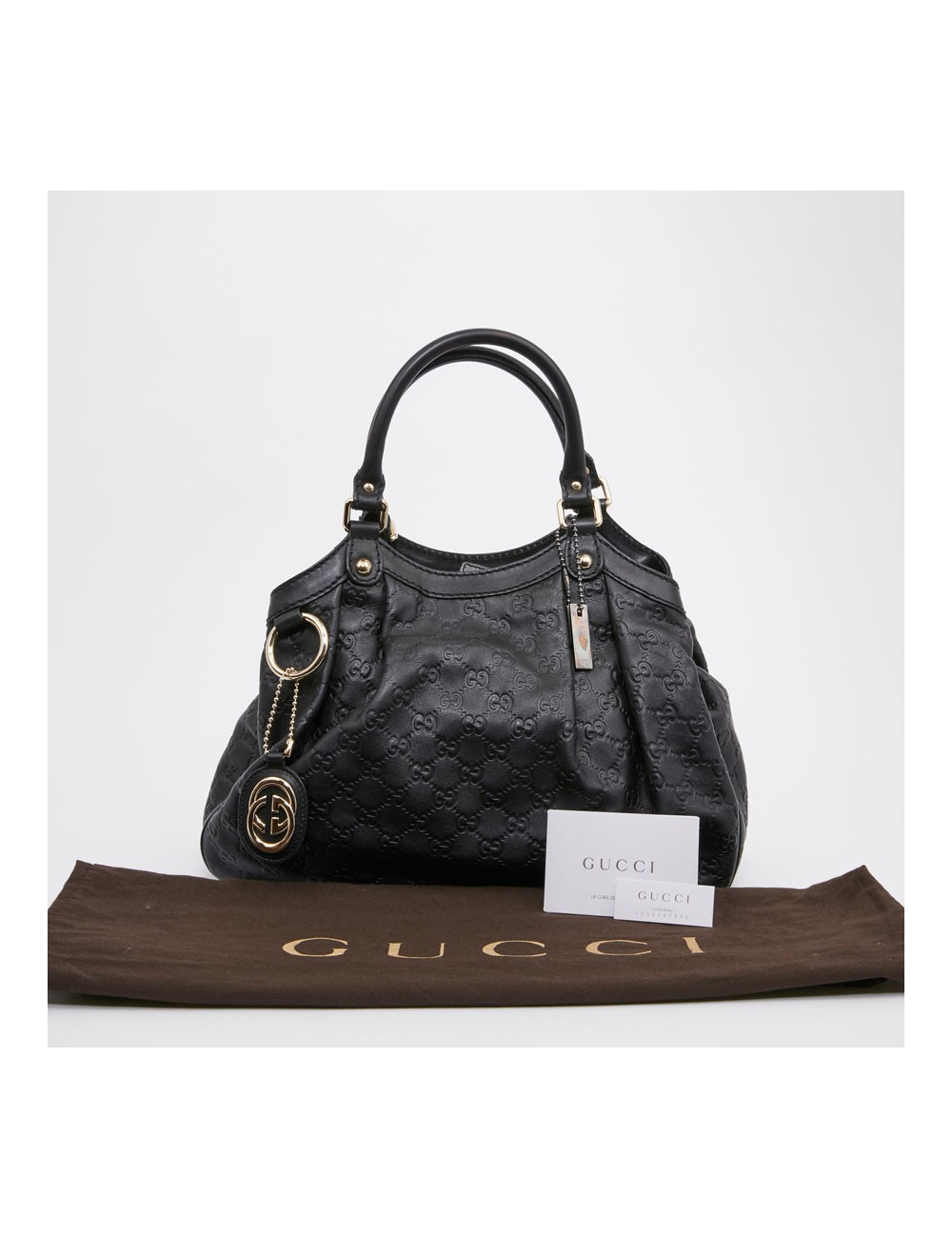 Sac GUCCI noir cuir embossé