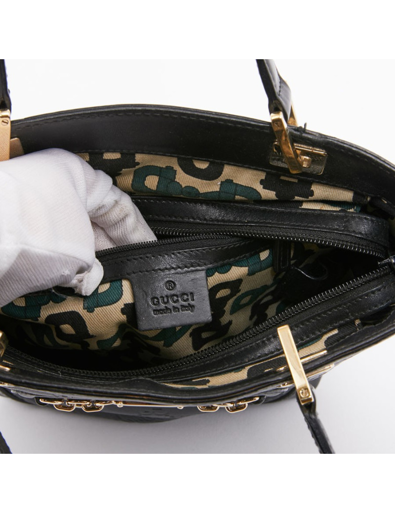 Sac seau GUCCI cuir noir et toile camouflage
