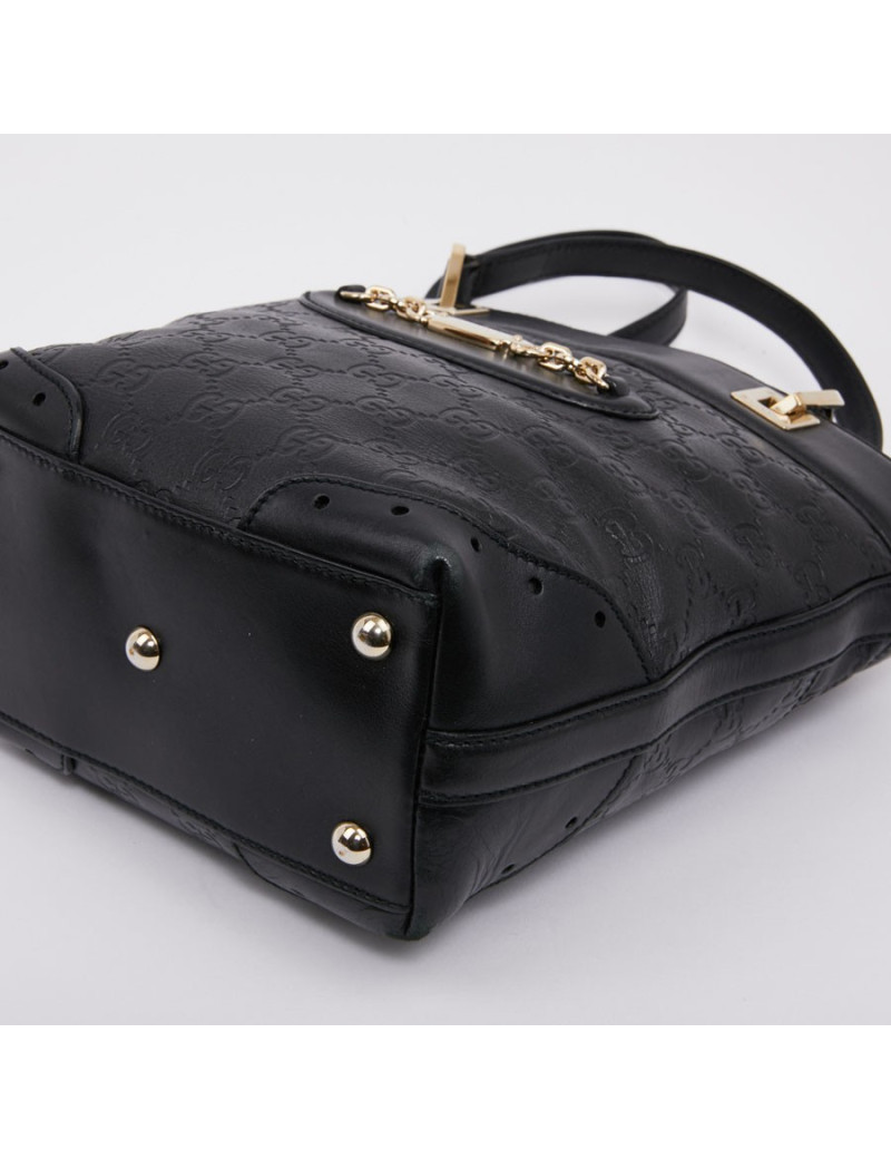 Sac seau GUCCI cuir noir et toile camouflage