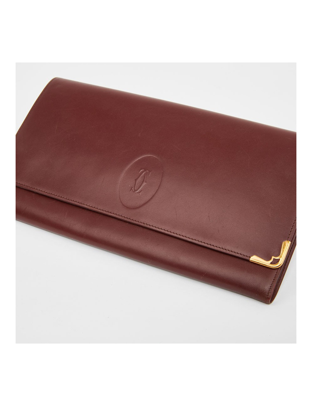 Pochette Cartier en cuir bordeaux