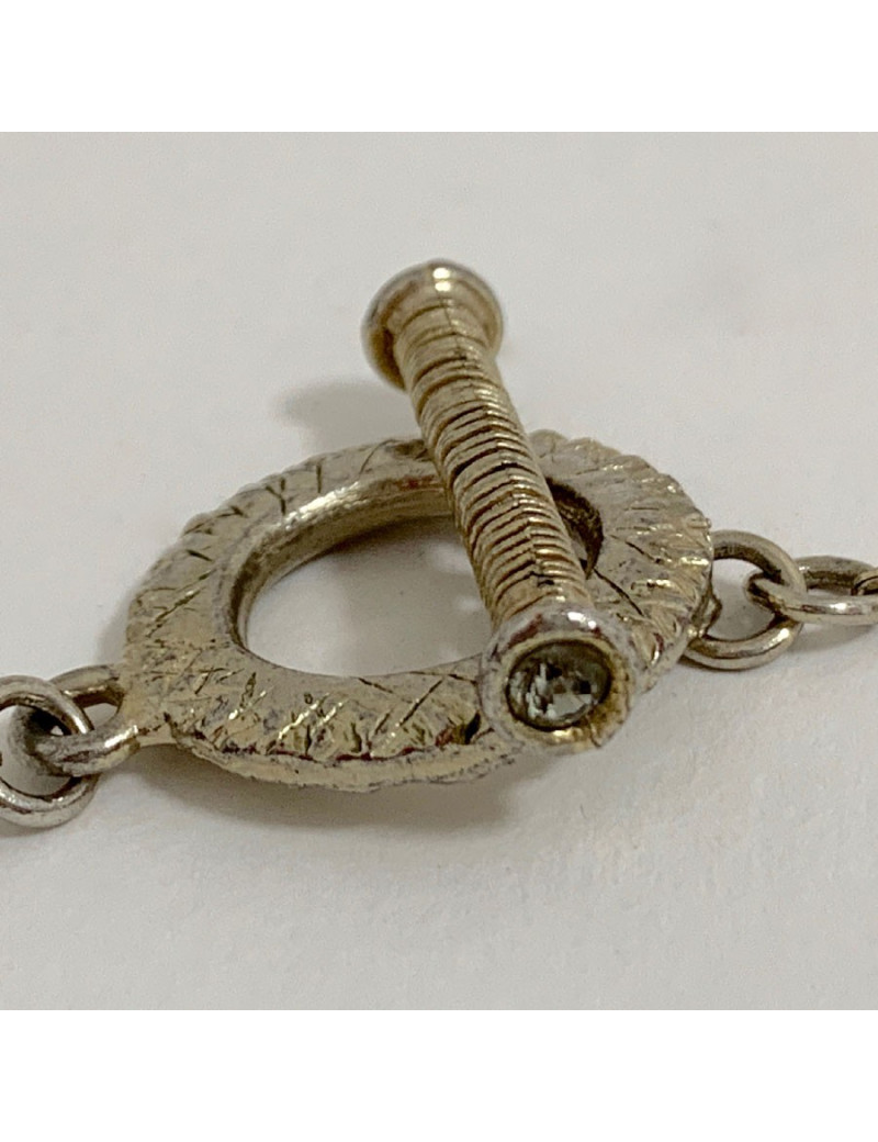 Long sautoir CHRISTIAN LACROIX doré et son pendentif argenté