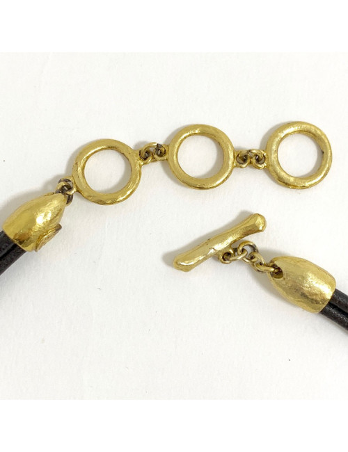 Collier CHRISTIAN LACROIX Vintage en cuir marron et pendentif doré