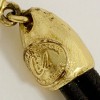 Collier CHRISTIAN LACROIX Vintage en cuir marron et pendentif doré