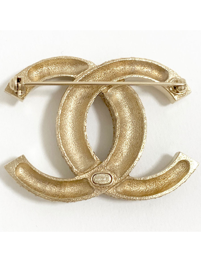 Broche CHANEL métal et strass CC doré