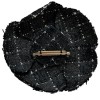 Broche camélia CHANEL tweed noir et blanc