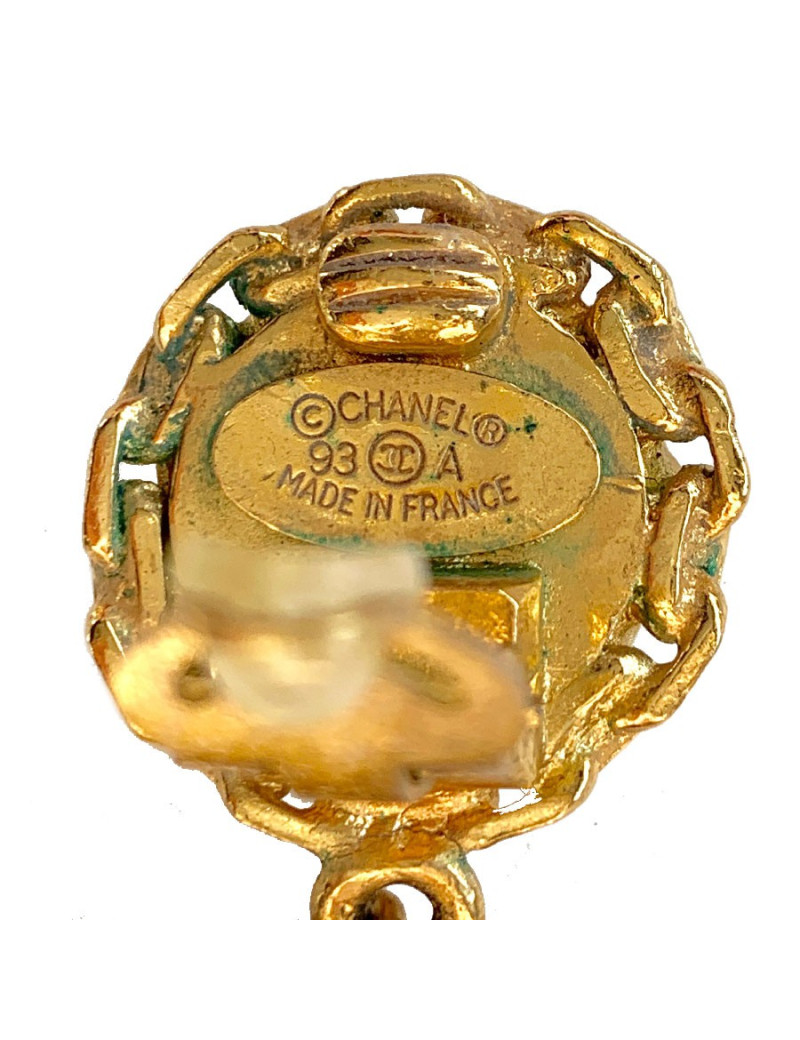 Boucle d’oreille chanel chaine et cuir