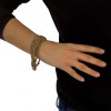Bracelet CHANEL chaînes entrelacés dorées et strass