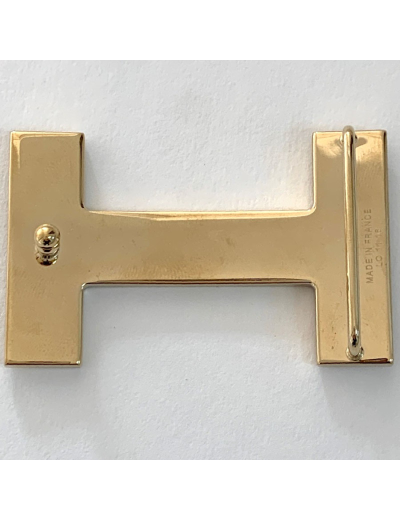 Boucle H HERMES métal doré mat