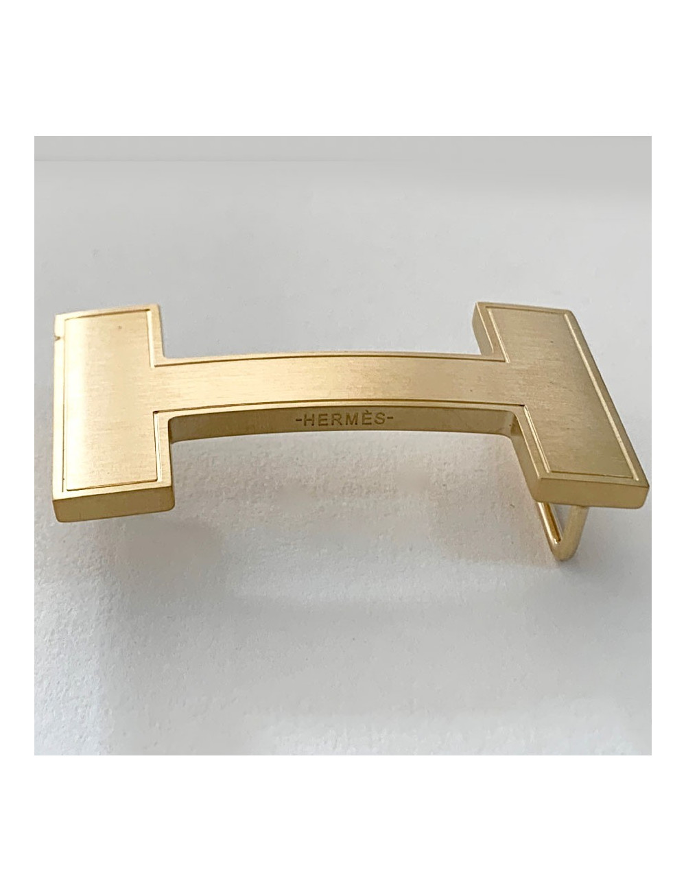 Boucle H HERMES métal doré mat