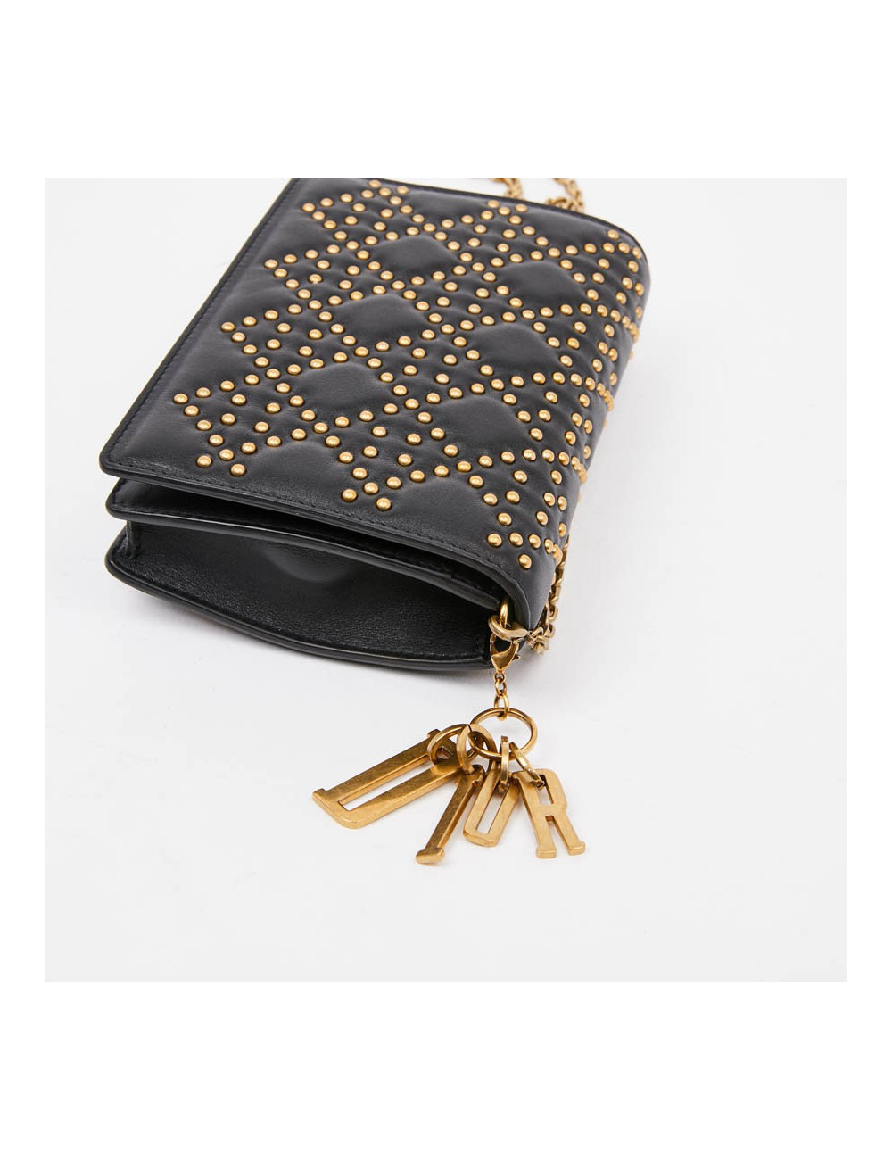 Sac pochette DIOR cuir noir clouté doré