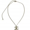 CHANEL necklace in gilt metal, CC pendant set with brilliants