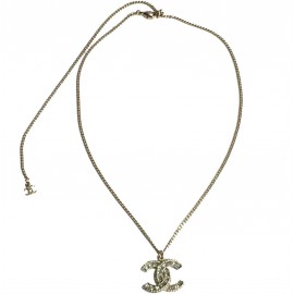 CHANEL necklace in gilt metal, CC pendant set with brilliants