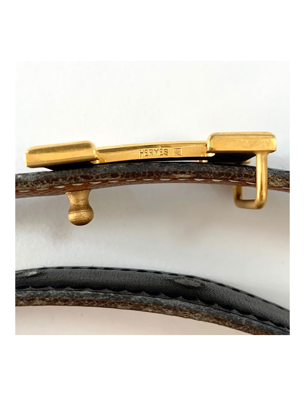 Ceinture H HERMES cuir noir et boucle dorée