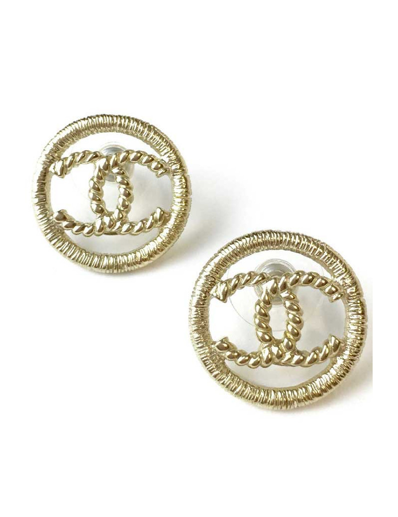 Boucles d'oreille clous CC CHANEL en métal doré