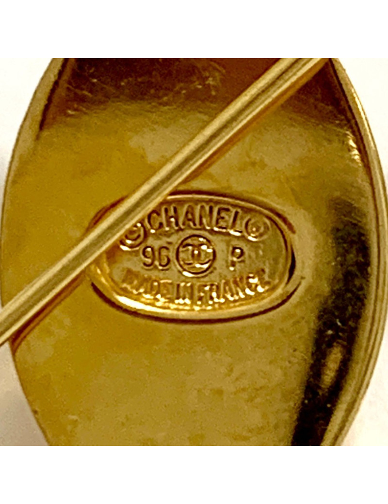 Broche CHANEL boucle dorée Vintage