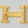 Boucle HERMES H dorée en métal 32 mm