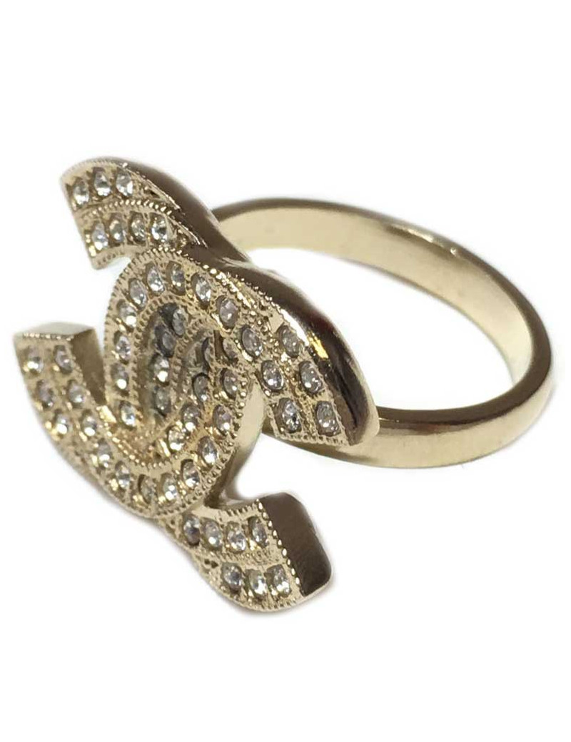Bague CHANEL T52 CC dore et strass Swarovski