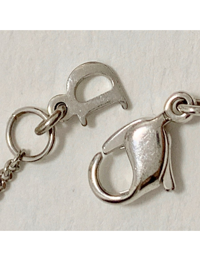 Bracelet DIOR croix strass et métal argenté