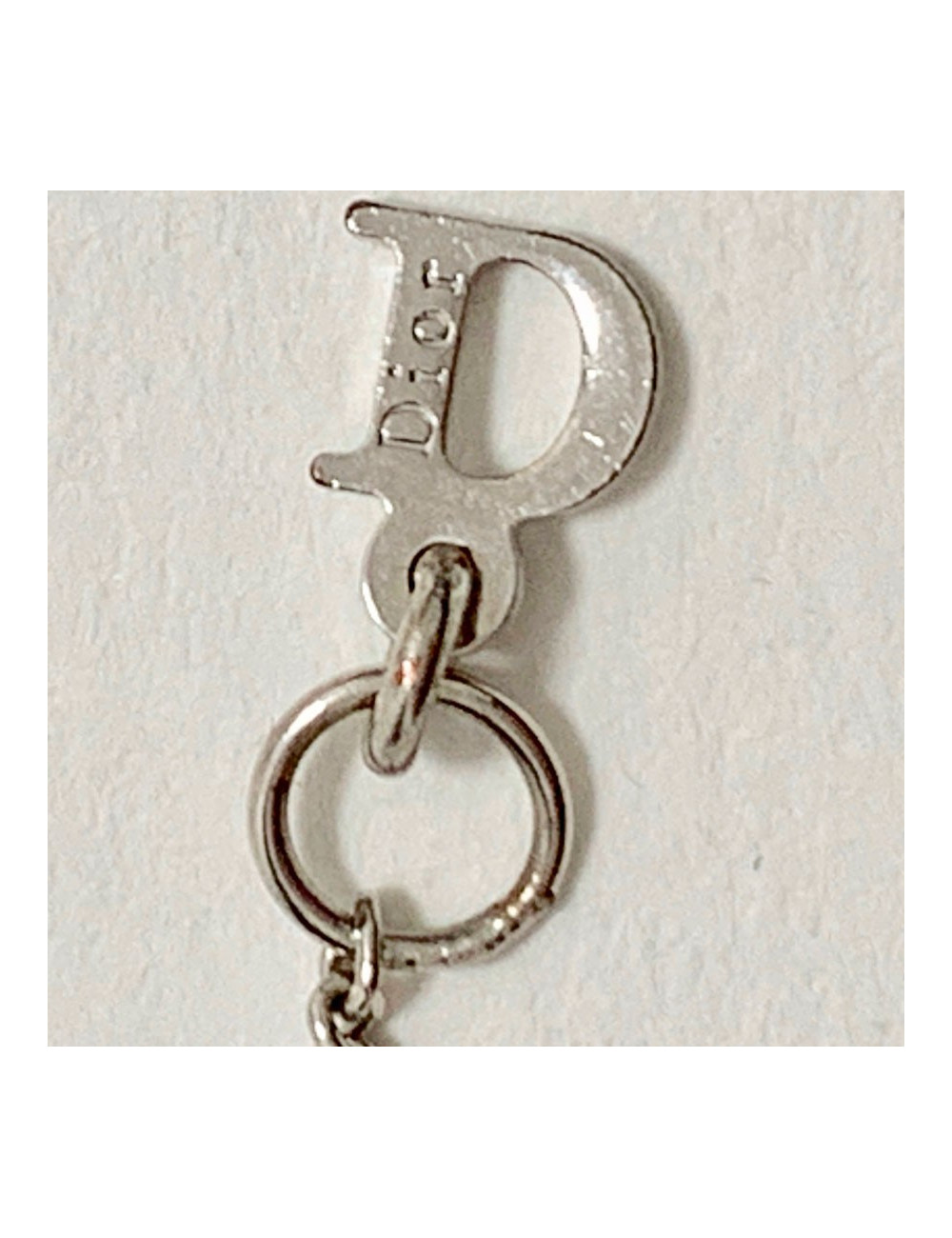 Bracelet DIOR croix strass et métal argenté