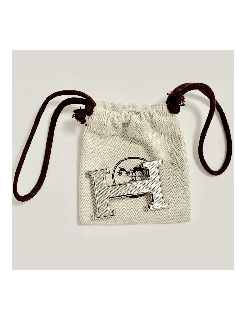 Boucle H HERMES guilloché argent