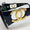 Vintage CHANEL Sunglasses CC in Gilt Metal and black acetate