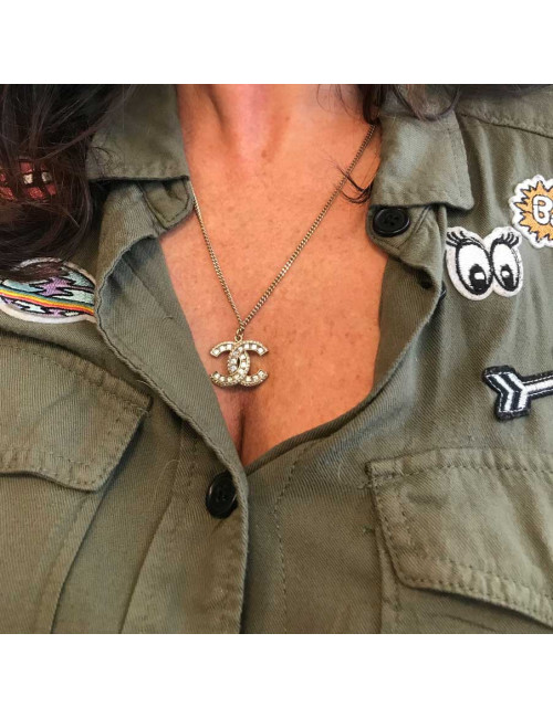CHANEL necklace in gilt metal, CC pendant set with brilliants
