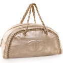 CHANEL bowling bag in gilt distressed leather