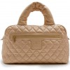  CHANEL 'Cocoon' bag in gold quilted leather