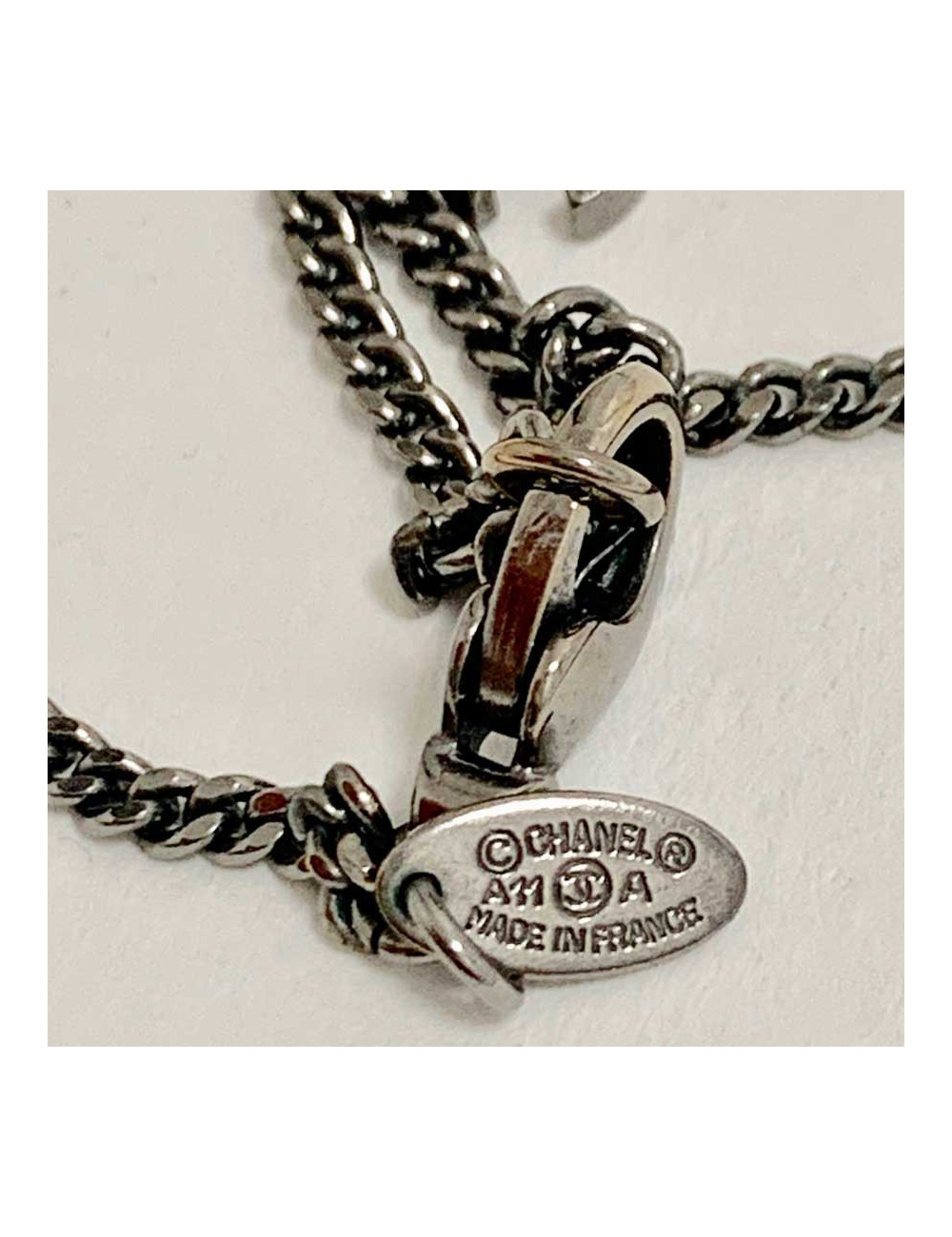 Collier camélias CHANEL chaine métal noir