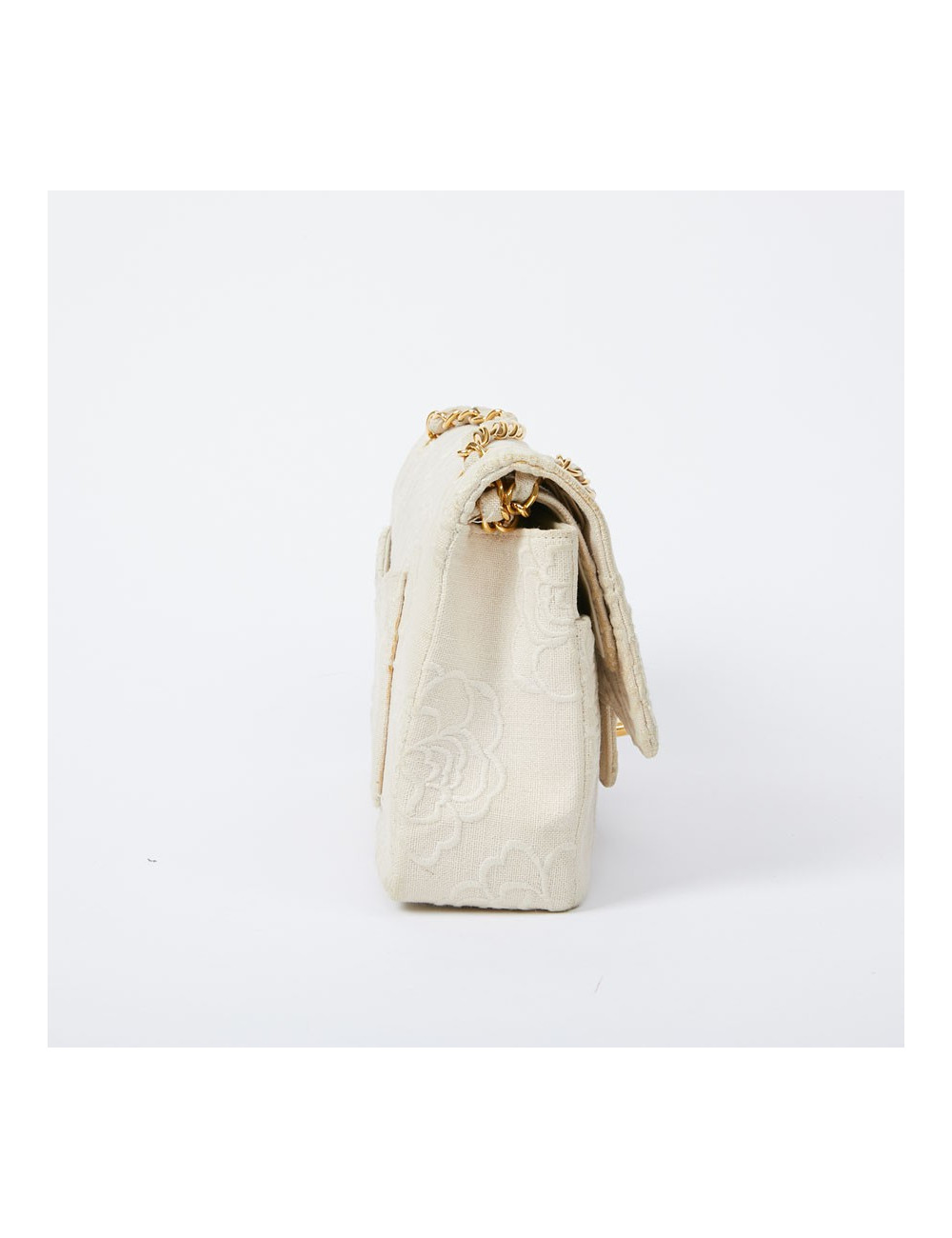 A NETTOYERSac motifs camélias CHANEL toile beige