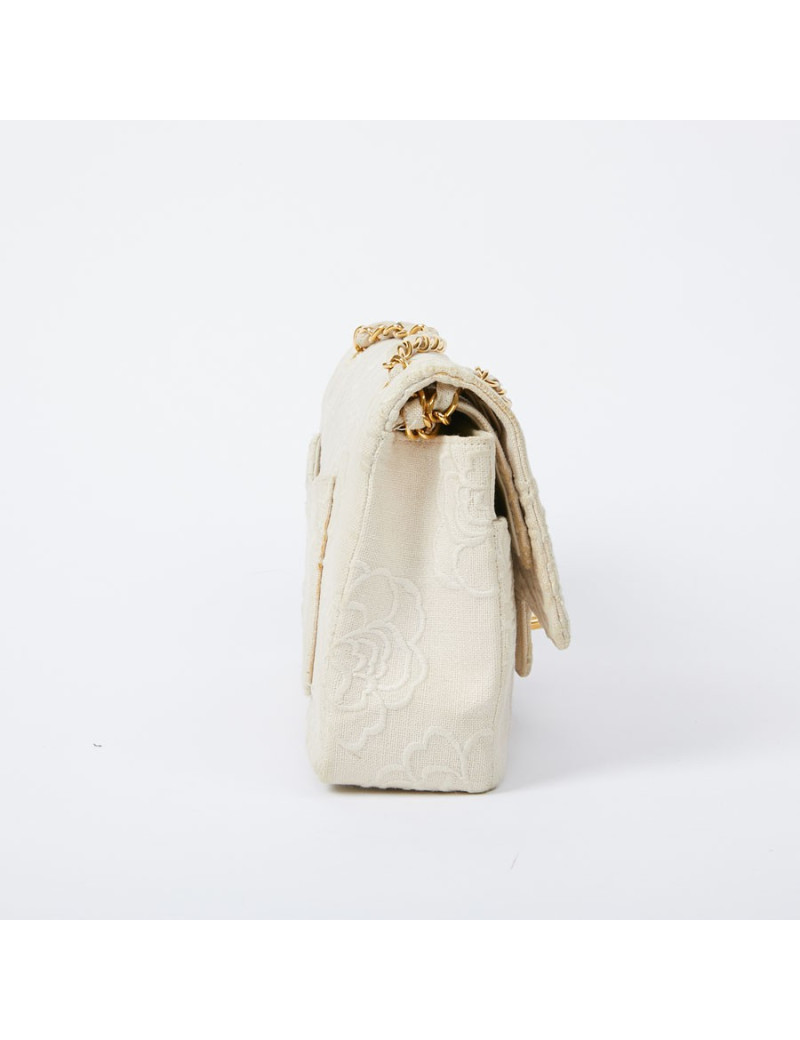 A NETTOYERSac motifs camélias CHANEL toile beige