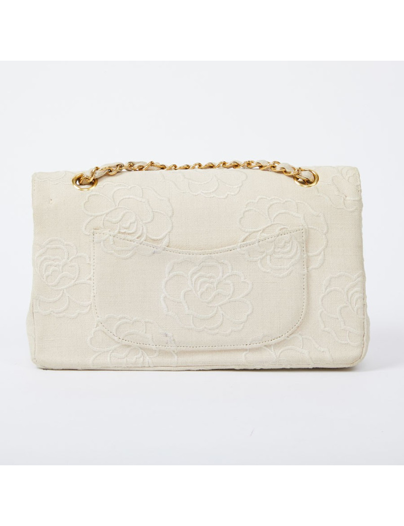 A NETTOYERSac motifs camélias CHANEL toile beige